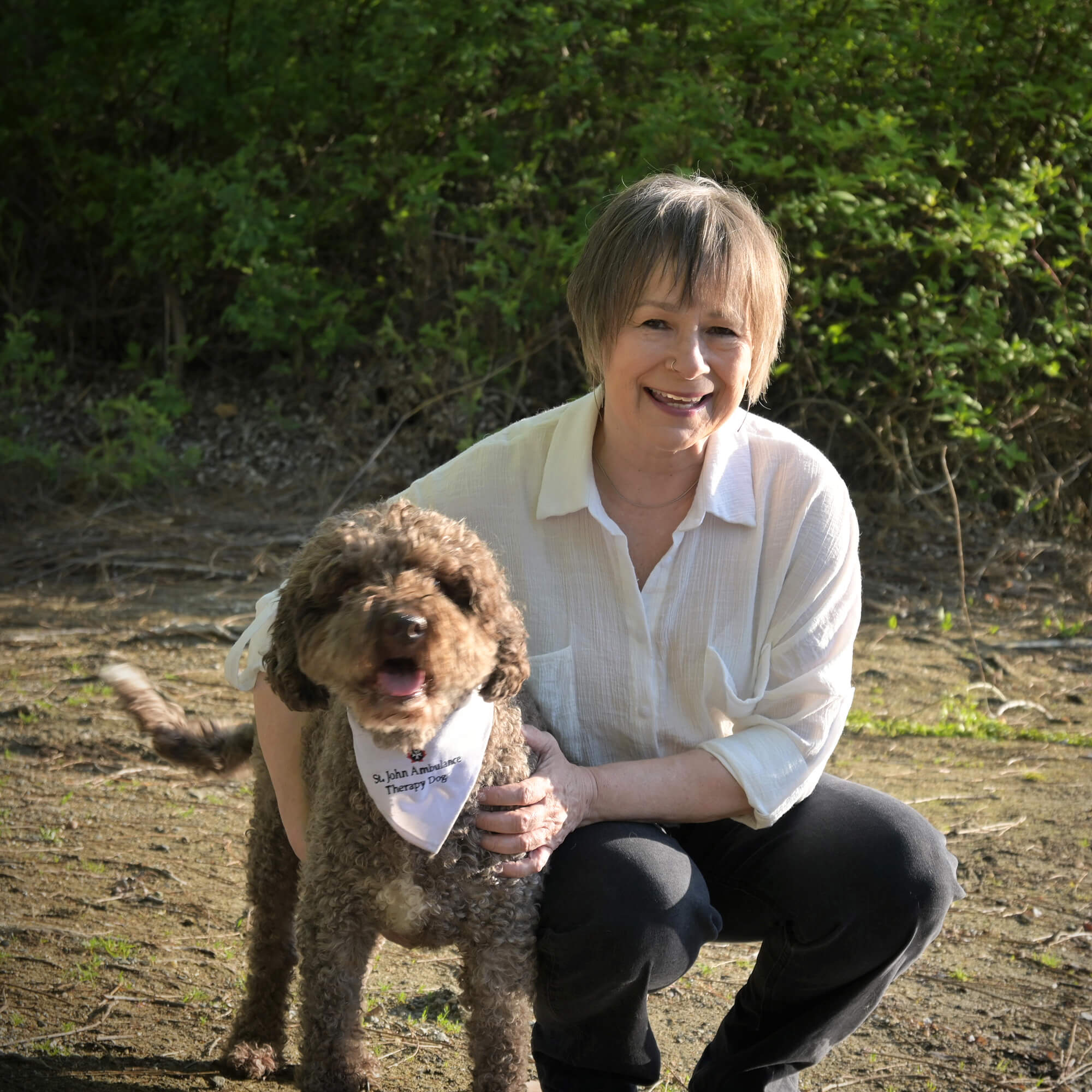 Therapist Lois Agrey and her therapy dog, Katia